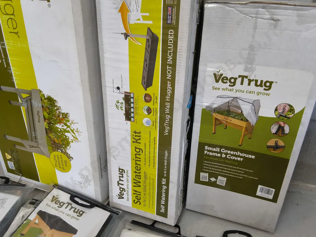 BRAND NEW WALL HUGGER, SELF WATERING KIT, SMALL GREENHOUSE, INCLUDING 3 SMALL SHADE COVERS, FLEECE COVER, ETC. Image 1++