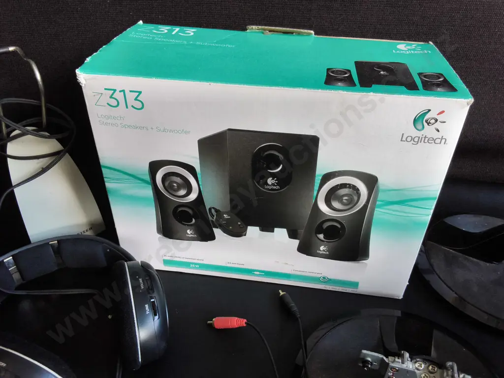 MIX OF ELECTRONICS, STEREO SPEAKERS BOXED, WIRELESS HEADPHONES, AND TV STAMDS Image 1++