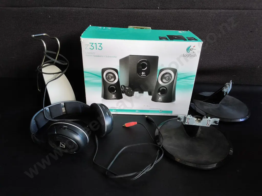 MIX OF ELECTRONICS, STEREO SPEAKERS BOXED, WIRELESS HEADPHONES, AND TV STAMDS Image 1++