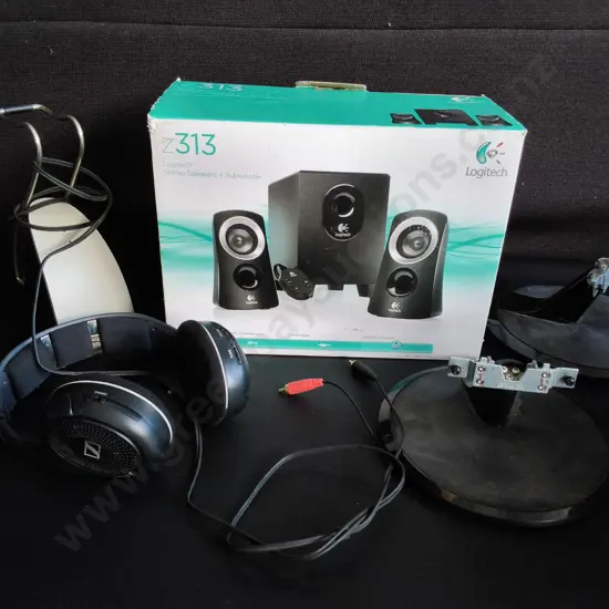 MIX OF ELECTRONICS, STEREO SPEAKERS BOXED, WIRELESS HEADPHONES, AND TV STAMDS