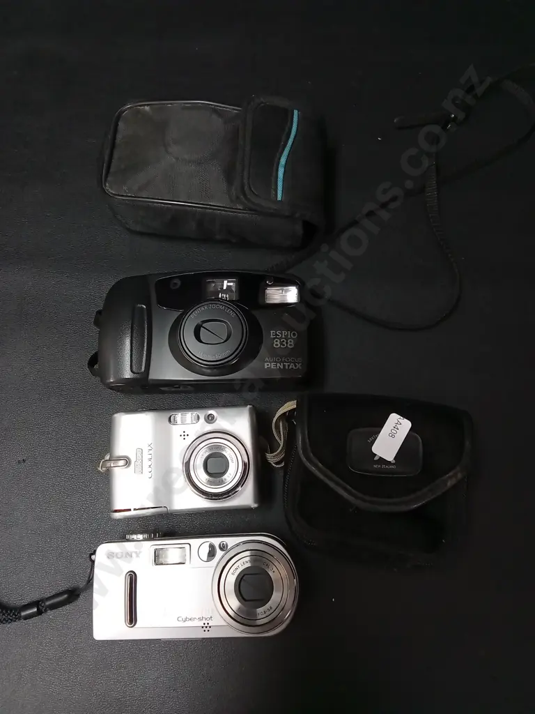3 VINTAGE CAMERAS, SONY CYBER-SHOT, NIKON COOLPIX AND PENTAX ESPIO 838 35MM Image 1++