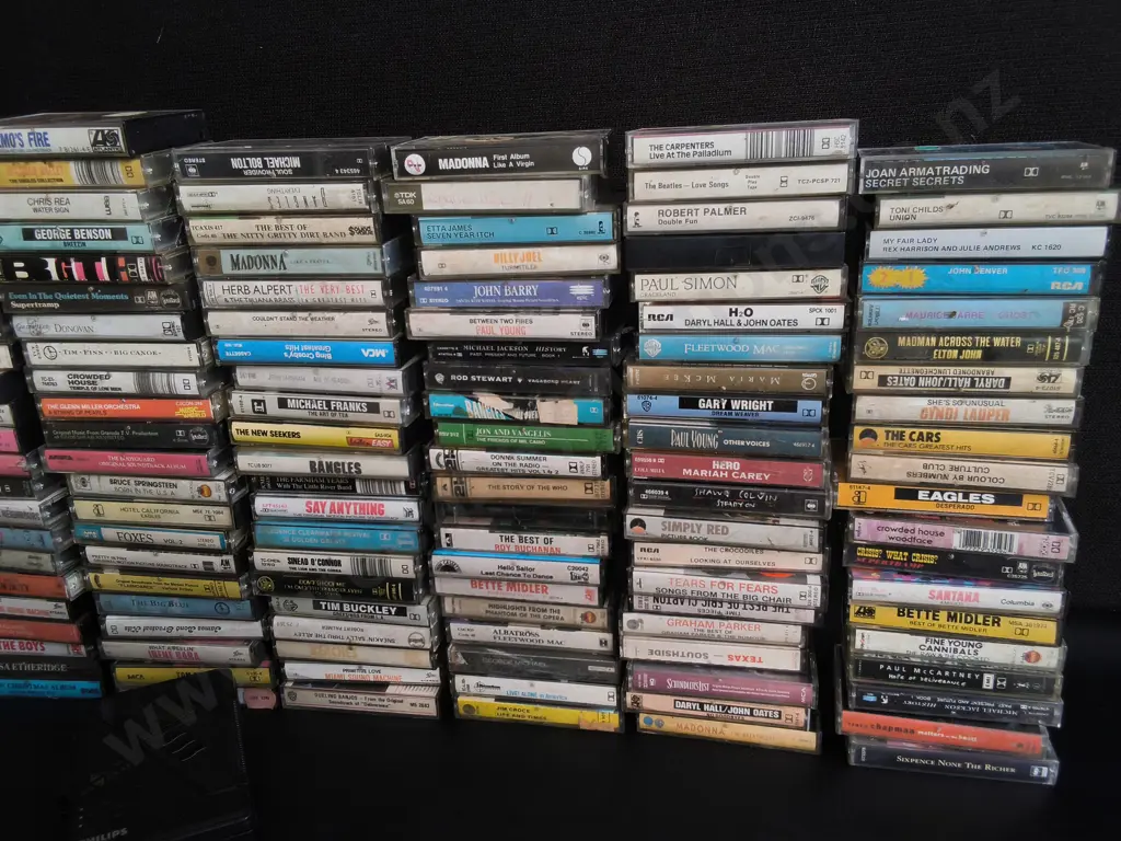 COLLECTION OF CASSETTES AND CASSETTE PLAYER Image 1++
