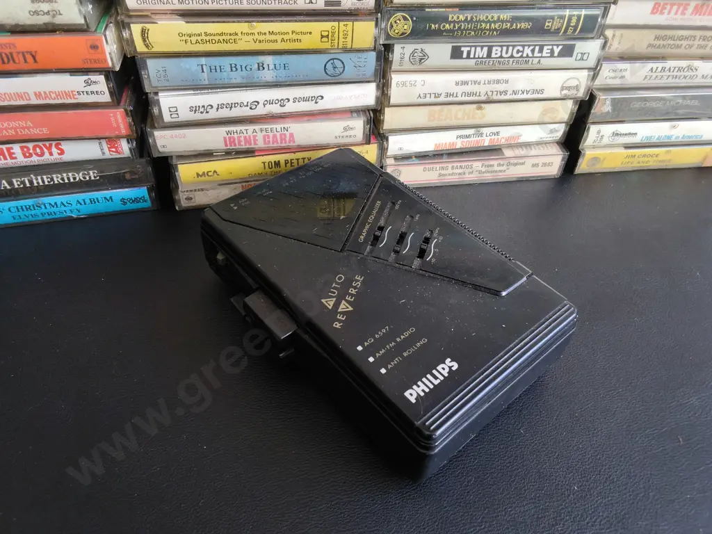 COLLECTION OF CASSETTES AND CASSETTE PLAYER Image 1++