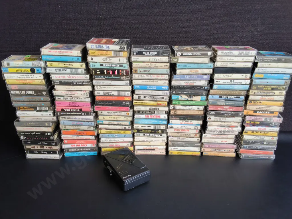 COLLECTION OF CASSETTES AND CASSETTE PLAYER Image 1++