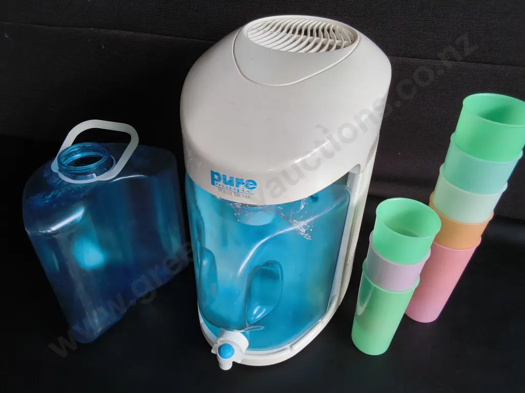 ERST BENS PURE MAGIC WATER DISTILLER, INCLUDING EXTRA TANK AND COLORFUL PLASTIC CUPS Image 1++