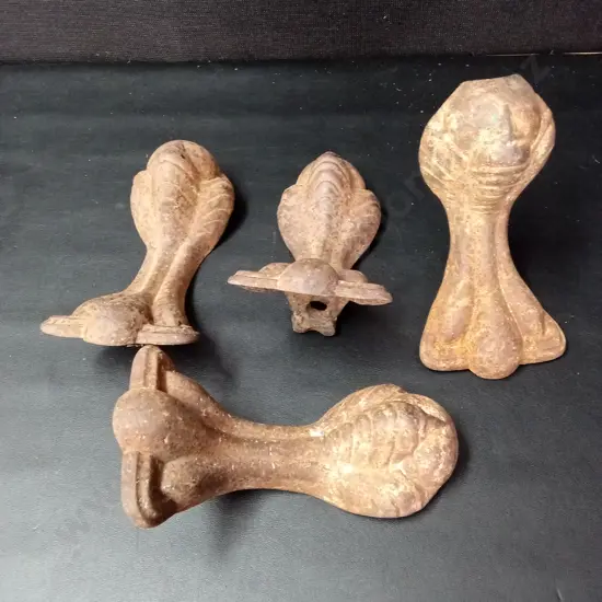 4 CAST IRON BALL AND CLAW BATHTUB FEET