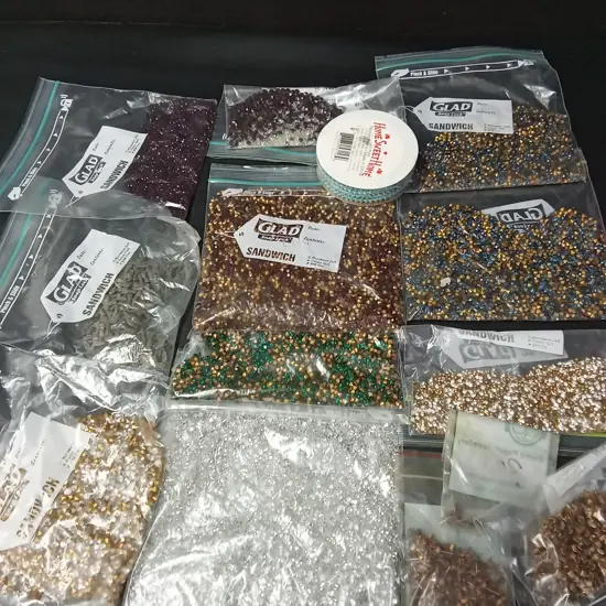 COLLECTION OF RHINESTONES AND EARRING STUDS