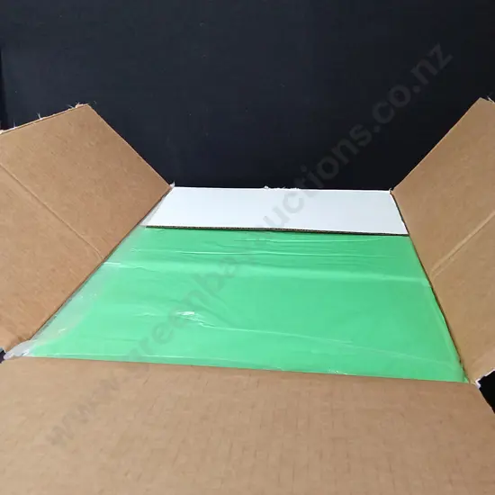 BOX OF COSMIC COLOR-FLO GREEN TISSUE PAPER 20" X 30"