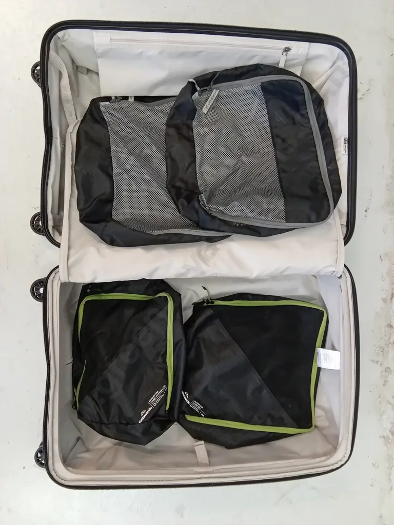 ANTLER SUITCASE WITH LOCK AND KATHMANDU PACKING CUBES, H 78CM W X 50CM X D 32CM Image 1++