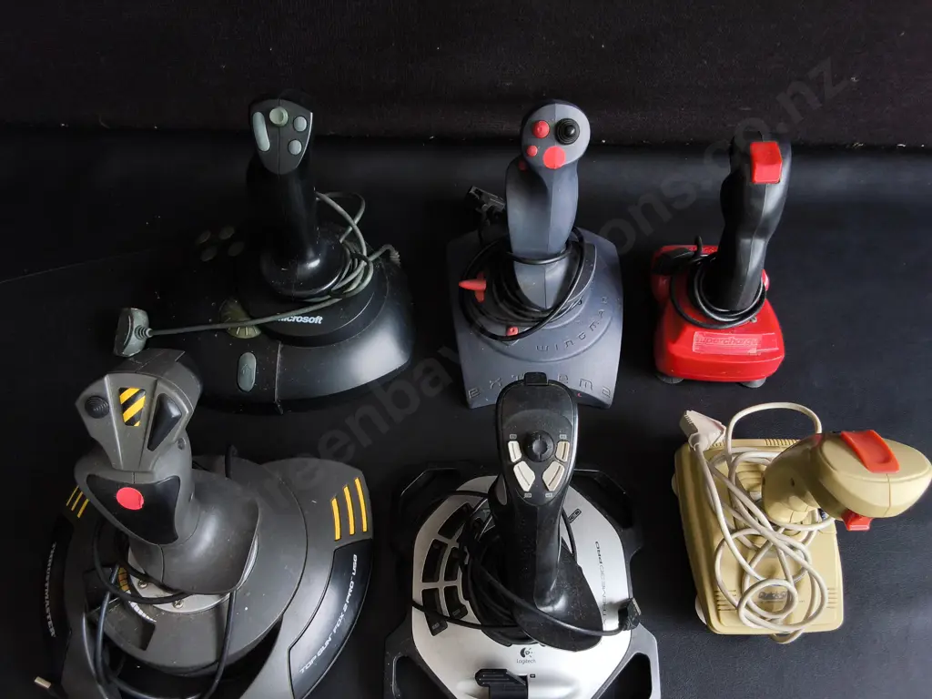 COLLECTION OF VINTAGE FLIGHT SIMULATOR JOYSTICKS Image 1++