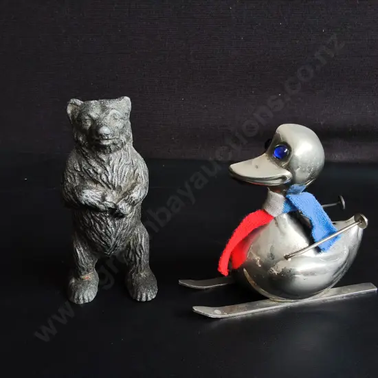 VINTAGE CAST METAL GRIZZLY BEAR STILL BANK, AND METAL SKIING DUCK COIN BANK, TALLEST H 13 CM