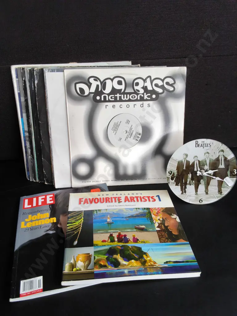 MIX OF VINTAGE RECORDS, MUSIC PUBLICATIONS, AND THE BEATLES CLOCK Image 1++