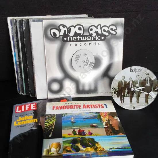 MIX OF VINTAGE RECORDS, MUSIC PUBLICATIONS, AND THE BEATLES CLOCK