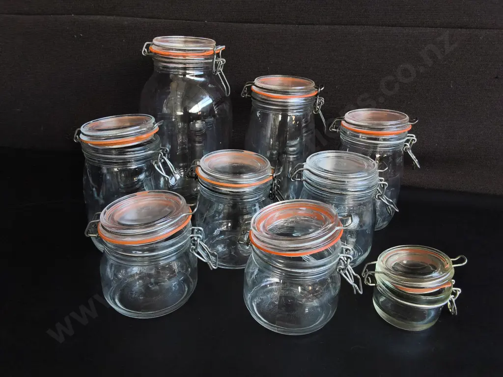 COLLECTION OF CLEAR GLASS CLIP TOP STORAGE JARS, 9 PIECES, INCLUDING BAG OF SPARE PARTS, TALLEST H 27 CM Image 1++