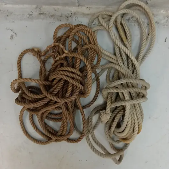 TWO BUNDLES OF ROPE, APPROXIMATELY 2CM THICK