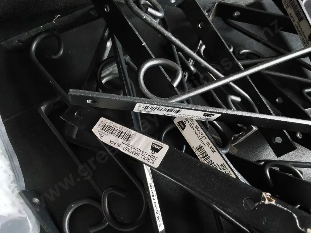 BOX OF SCROLL BRACKETS AND TILE SPACERS Image 1++