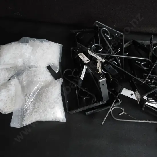 BOX OF SCROLL BRACKETS AND TILE SPACERS