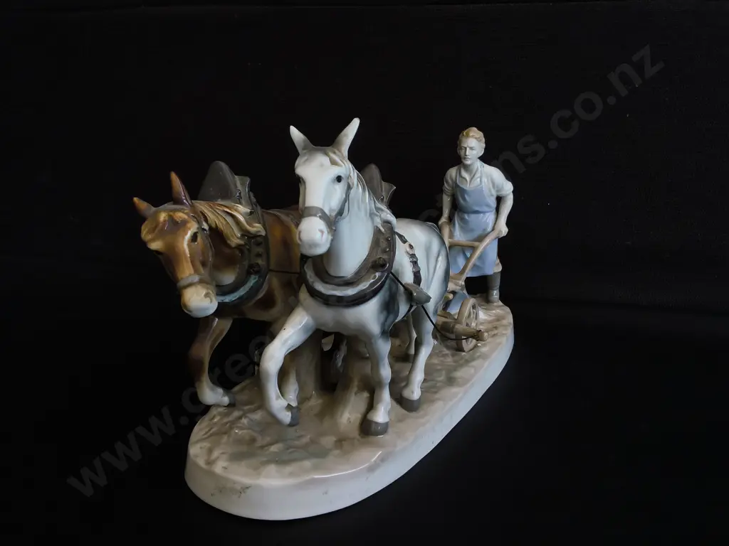 VINTAGE GERMAN PORCELIAN FIRGURINE, FARMER PLOWING FIELD WITH TWO WORKHORSES, W APPROX 37 CM Image 1++