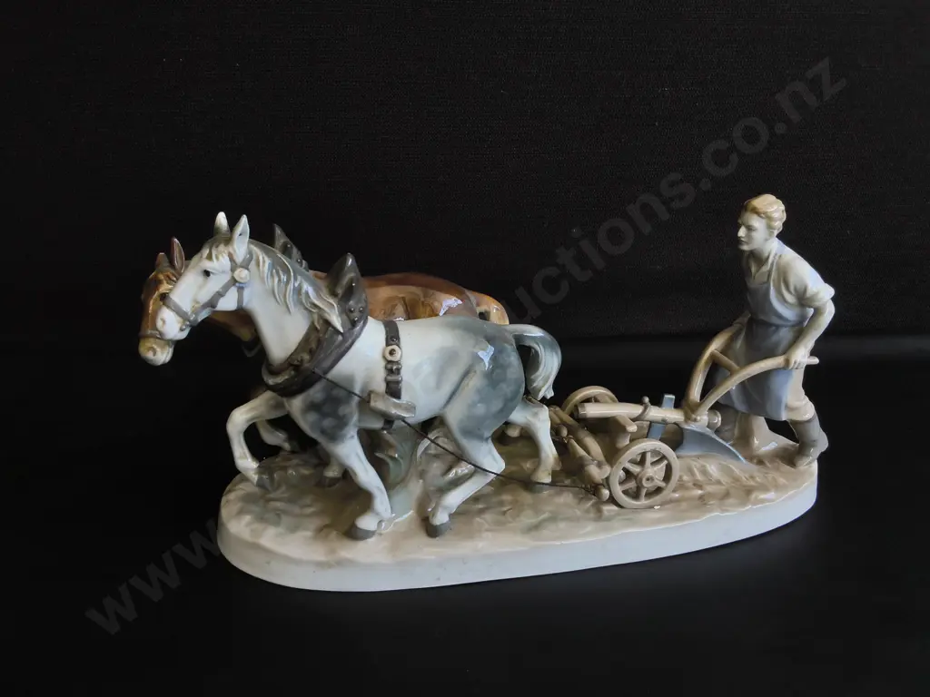VINTAGE GERMAN PORCELIAN FIRGURINE, FARMER PLOWING FIELD WITH TWO WORKHORSES, W APPROX 37 CM Image 1++