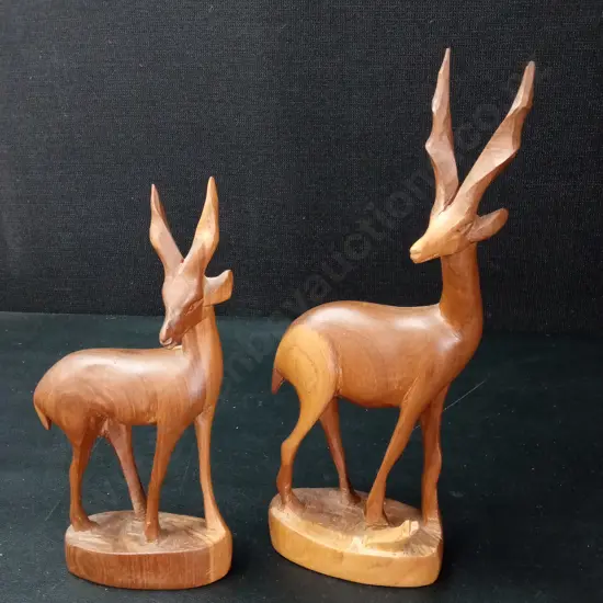 2 CARVED WOODEN ANTELOPE FIGURES TALLEST H23CM