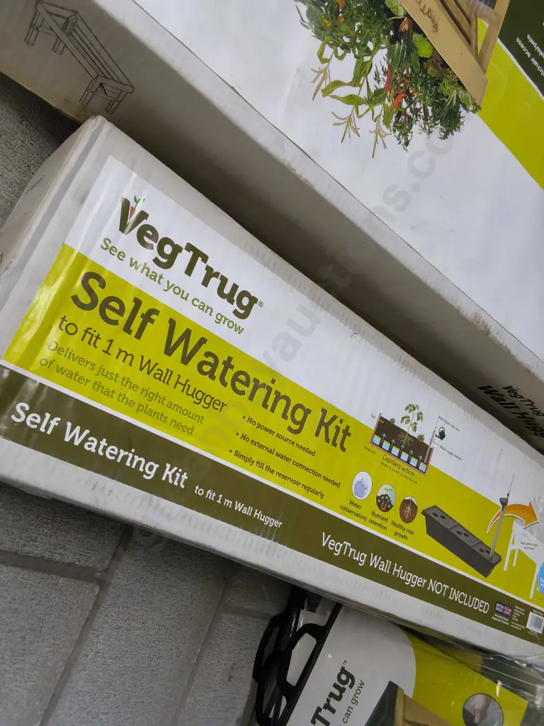 BRAND NEW WALL HUGGER, SELF WATERING KIT, AND 10 SMALL LINERS Image 1++