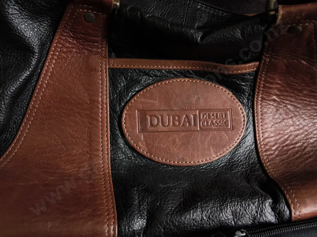 VINTAGE TWO TONE LEATHER DUFFEL BAG, W 44 CM APPROX Image 1++
