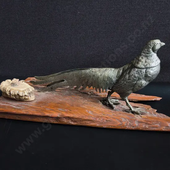 METAL BIRD FIGURINE MOUNTED ON TEXTURED WOODEN PLAQUE, W 37 CM