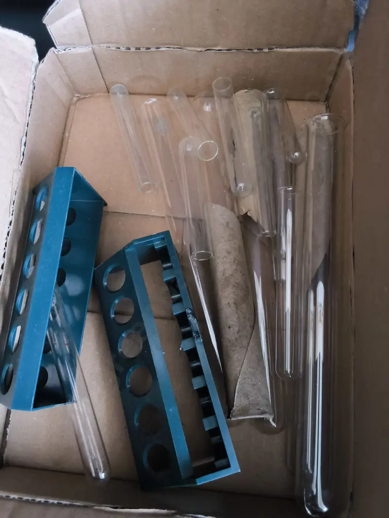 BOX OF VINTAGE LABARATORY GLASSWARE AND METAL TUBES Image 1++