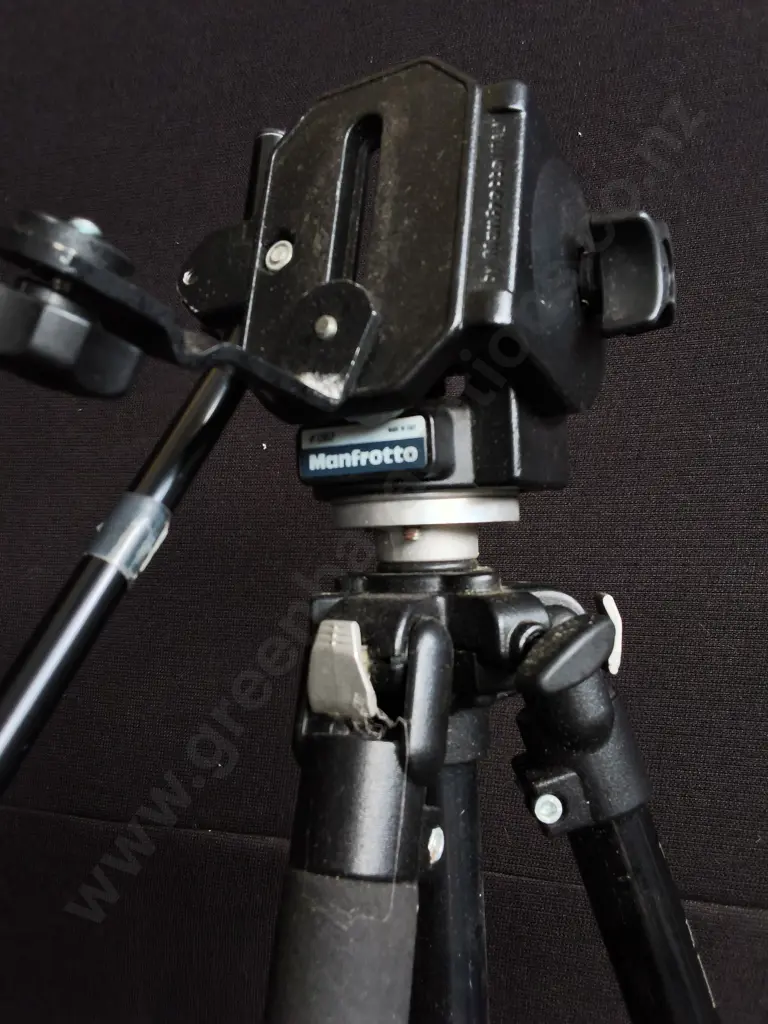 PAIR OF CAMERA TRIPODS, ONE WITH CASE, MANFROTTO AND LOMEX Image 1++