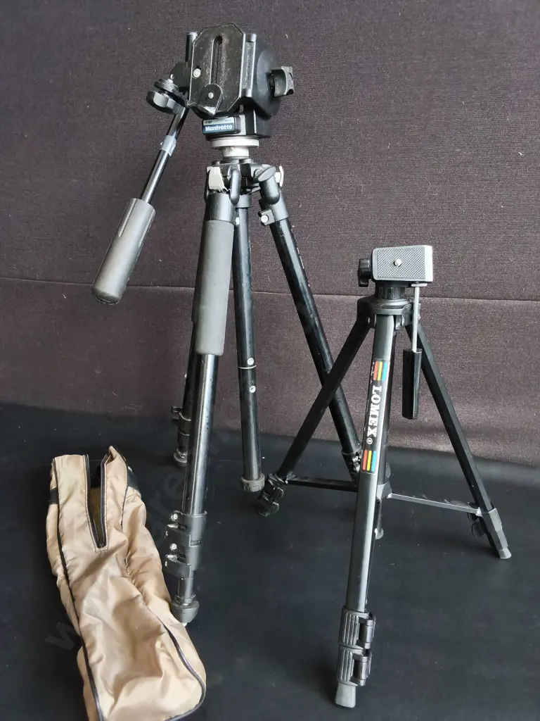 PAIR OF CAMERA TRIPODS, ONE WITH CASE, MANFROTTO AND LOMEX Image 1++