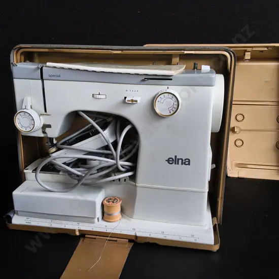 VINTAGE ELNA SPECIAL PORTABLE SEWING MACHINE WITH METAL CARTYING CASE