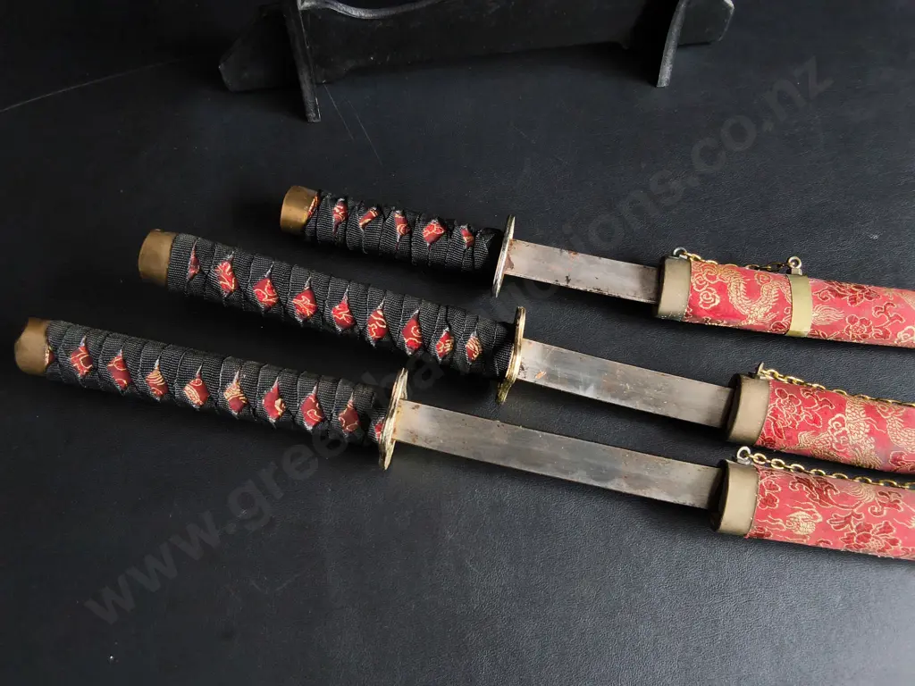 3 PIECE JAPANESE SAMURAI SWORD SET WITH DISPLAY STAND, RED AND GOLD DRAGON DESIGN Image 1++