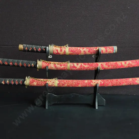 3 PIECE JAPANESE SAMURAI SWORD SET WITH DISPLAY STAND, RED AND GOLD DRAGON DESIGN