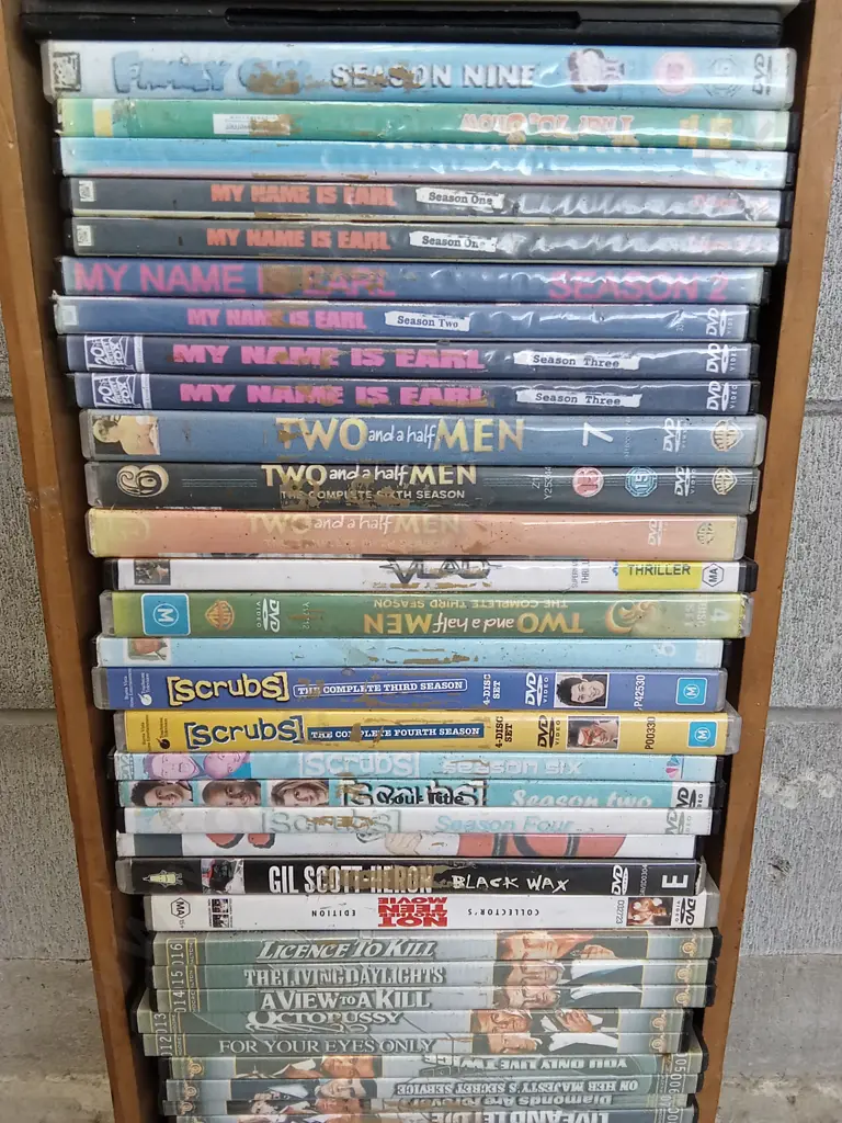 DVD CASE STAND WITH DVDS, H 100CM X W 22CM X D 14CM Image 1++