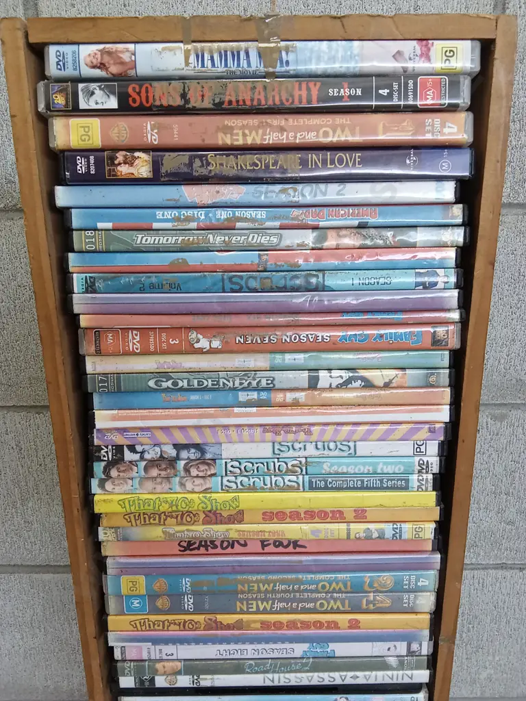 DVD CASE STAND WITH DVDS, H 100CM X W 22CM X D 14CM Image 1++
