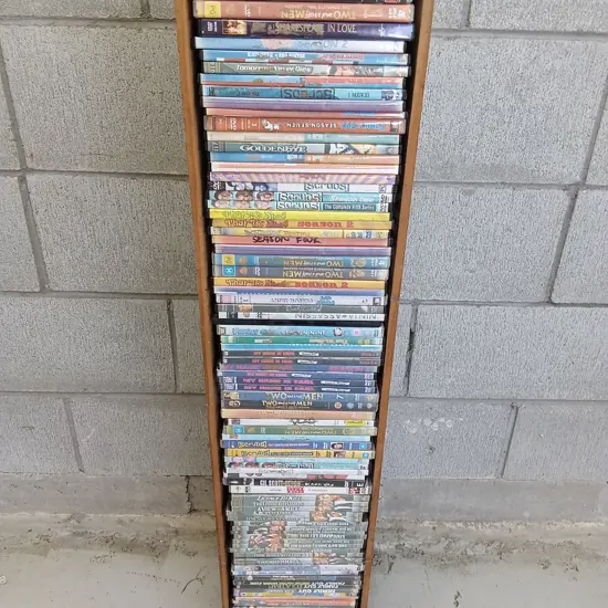 DVD CASE STAND WITH DVDS, H 100CM X W 22CM X D 14CM