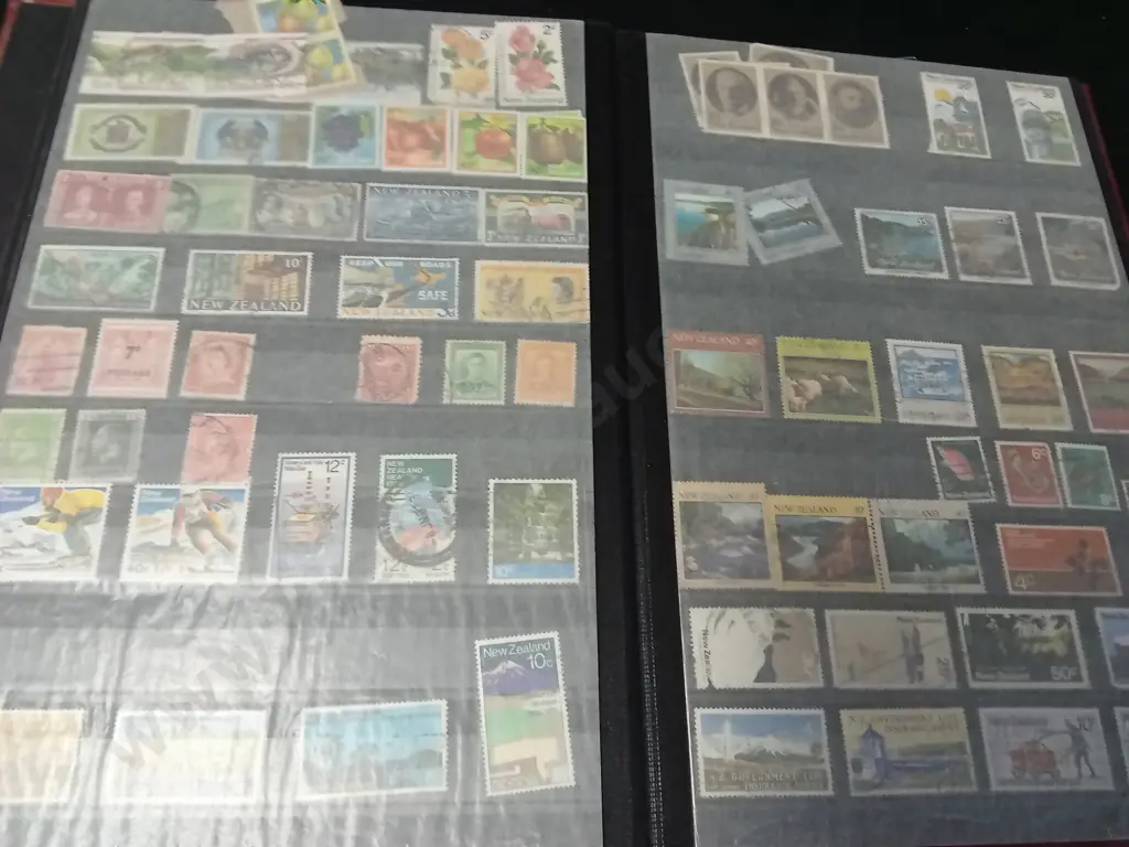2 STAMP ALBUMS Image 1++