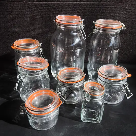 COLLECTION OF CLEAR GLASS CLIP TOP STORAGE JARS, 8 PIECES, TALLEST H 27 CM