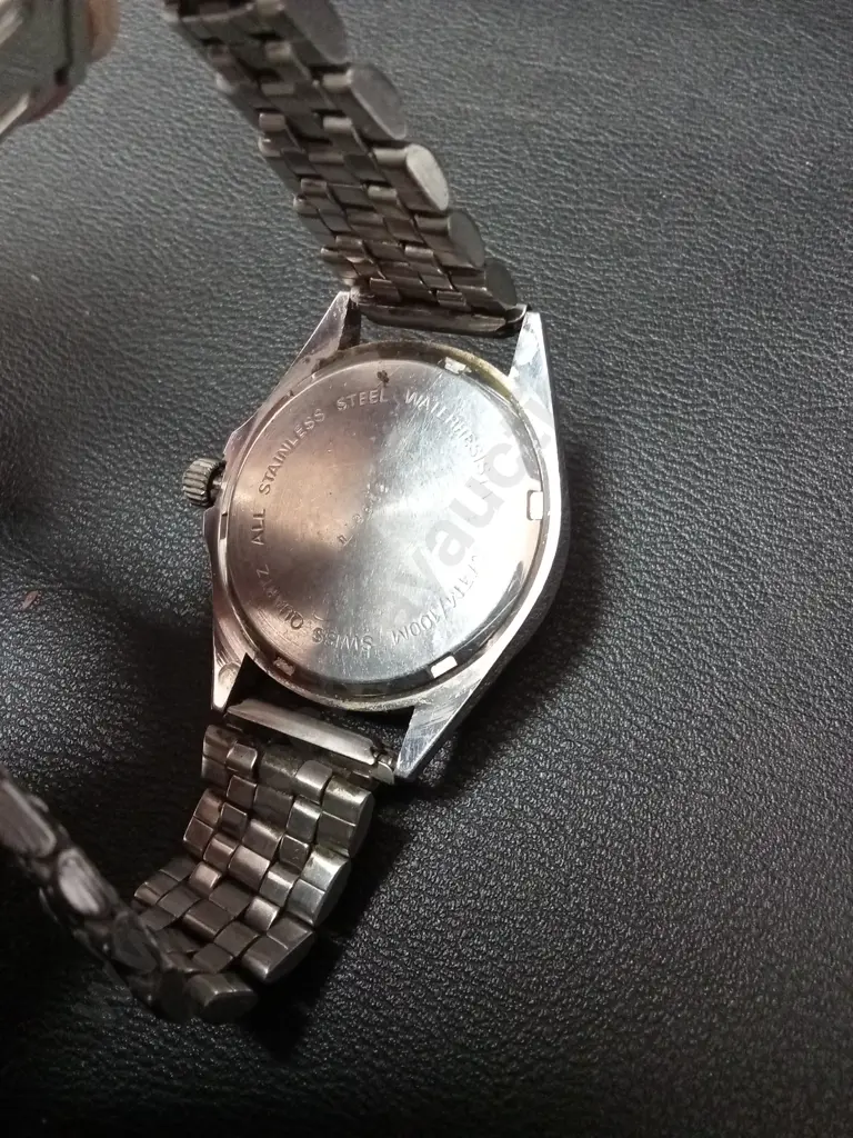 VINTAGE OLYMPIC WRIST WATCH, NEEDS BATTERY Image 1++