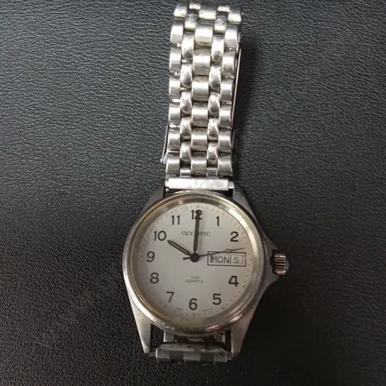 VINTAGE OLYMPIC WRIST WATCH, NEEDS BATTERY