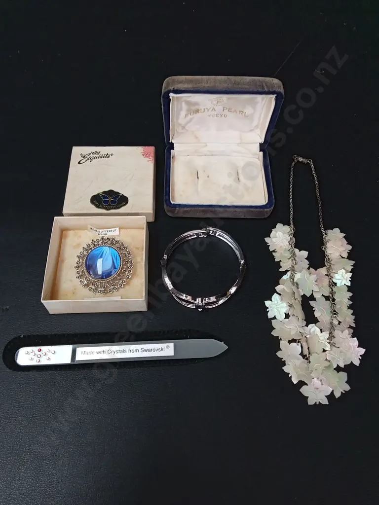 SWAROVSKI CRYSTAL NAIL FILE, JAPANESE FURYUA PEAR NECKLACE, VINTAGE BUTTERFLY WING BROOCH AND A SAPHIRE BRACELET Image 1++