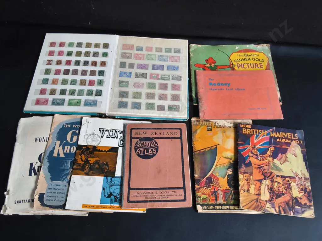 COLLECTION OF VINTAGE NZ AND BRITISH PRINTED EPHEMERA,  STAMP ALBUM, CIGARETTE CARD BOOKS, ETC Image 1++