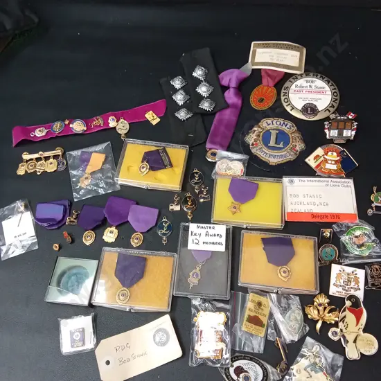 COLLECTION OF VINTAGE LIONS CLUB AWARDS, PINS AND BADGES