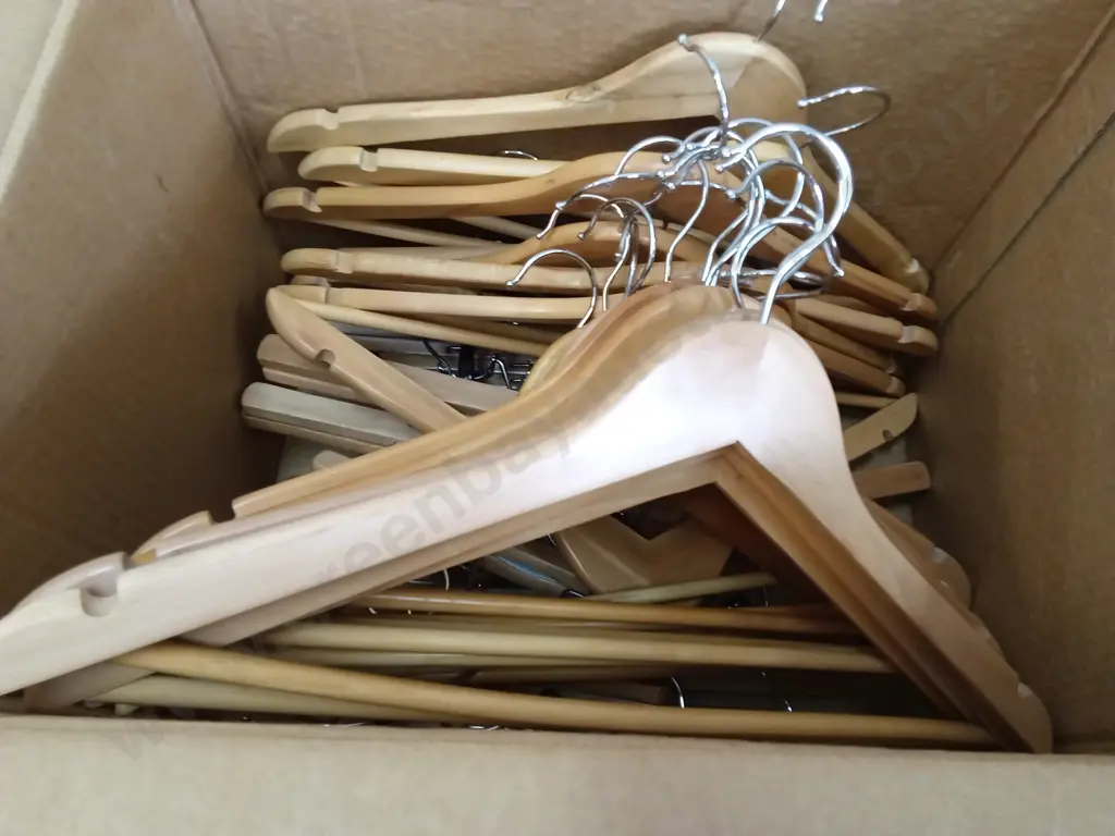 BOX OF WOODEN COAT HANGERS Image 1++