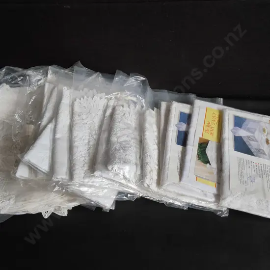 COLLECTION OF BRAND NEW TABLECLOTHS, PACKAGED