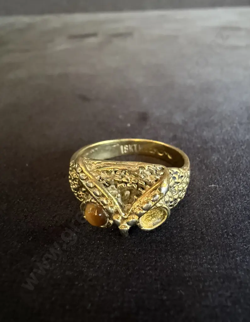 GOLD RING MARKED 18KT HGE WITH ONE EYE STONE MISSING Image 1++