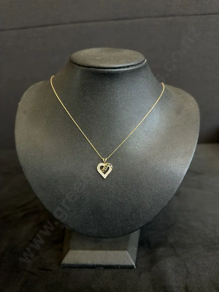 FINE GOLD CHANGE WITH I LOVE YOU HEART PENDANT MARKED 10K CONTAINING WHITE STONES TESTED AS DIAMONDS Image 1++