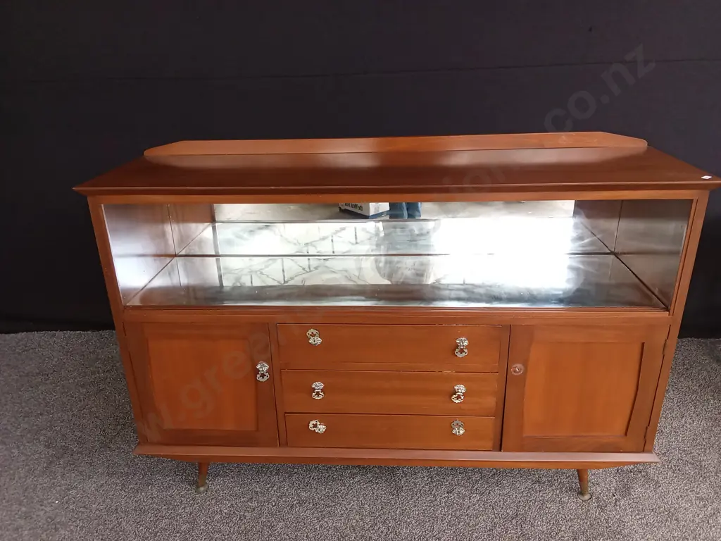 MAHOGANY AND RIMU DISPLAY CABINET WITH DRAWERS (ONE MISSING KNOB AND SLIDING GLASS DOORS) Image 1++