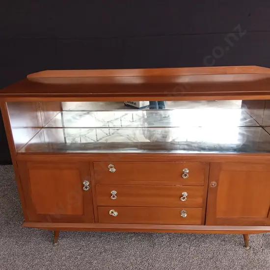 MAHOGANY AND RIMU DISPLAY CABINET WITH DRAWERS (ONE MISSING KNOB AND SLIDING GLASS DOORS)