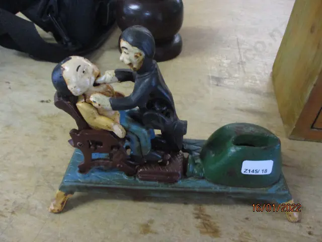 Cast Iron Dentist Toy Image 1++